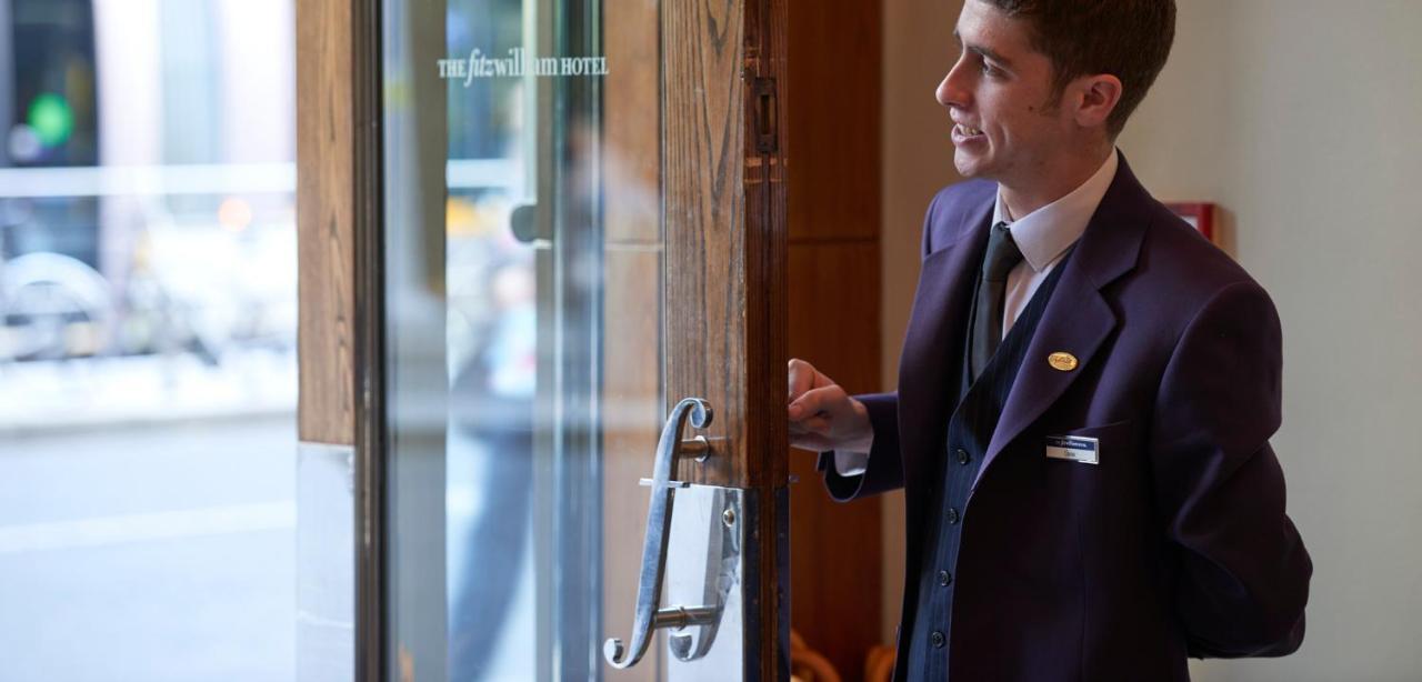 The Fitzwilliam Hotel Dublin Eksteriør bilde A doorman at The New Albany Hotel